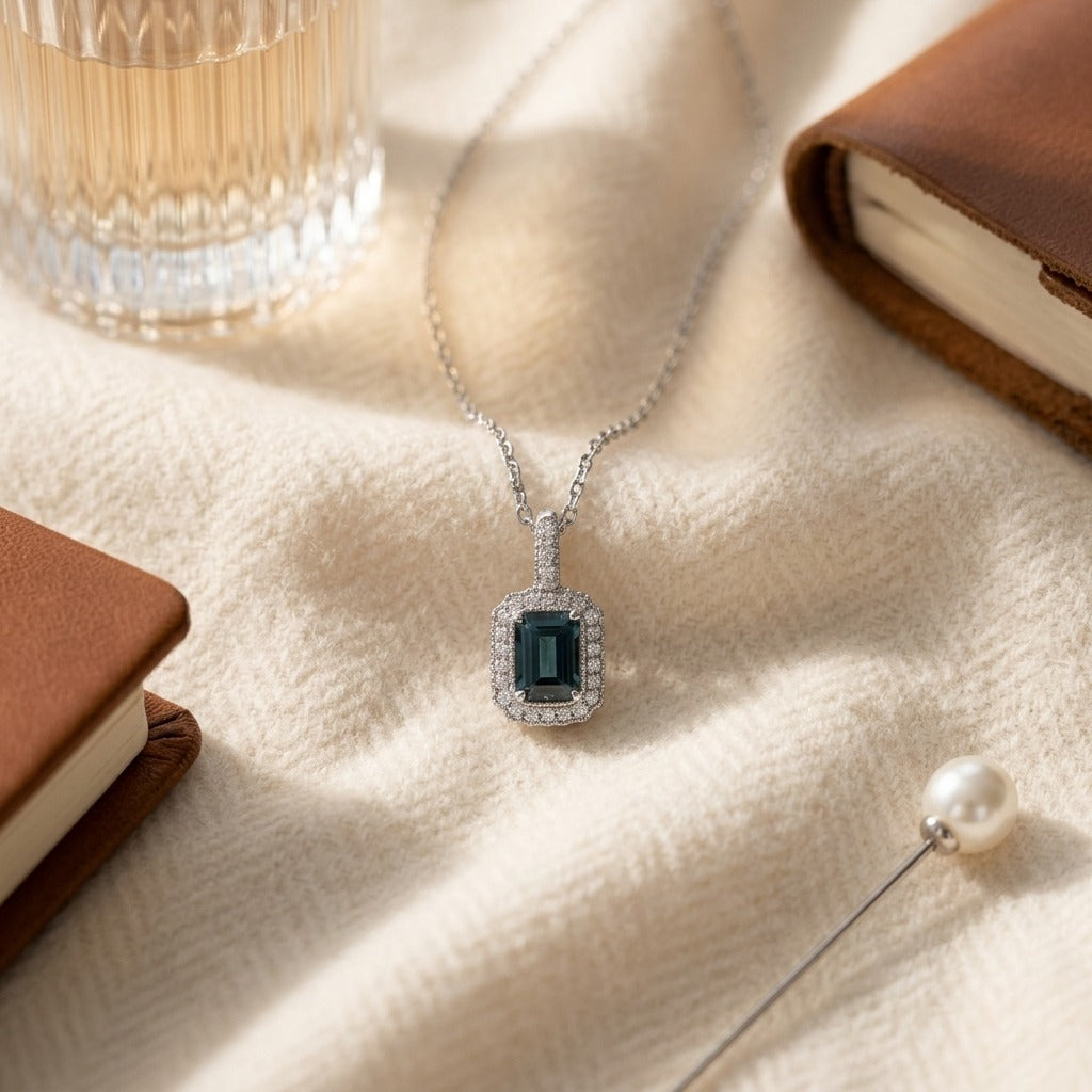 London Blue Topaz & Diamond 1/6ctw Pendant Set in 14k White Gold with Chain — textile flat lay