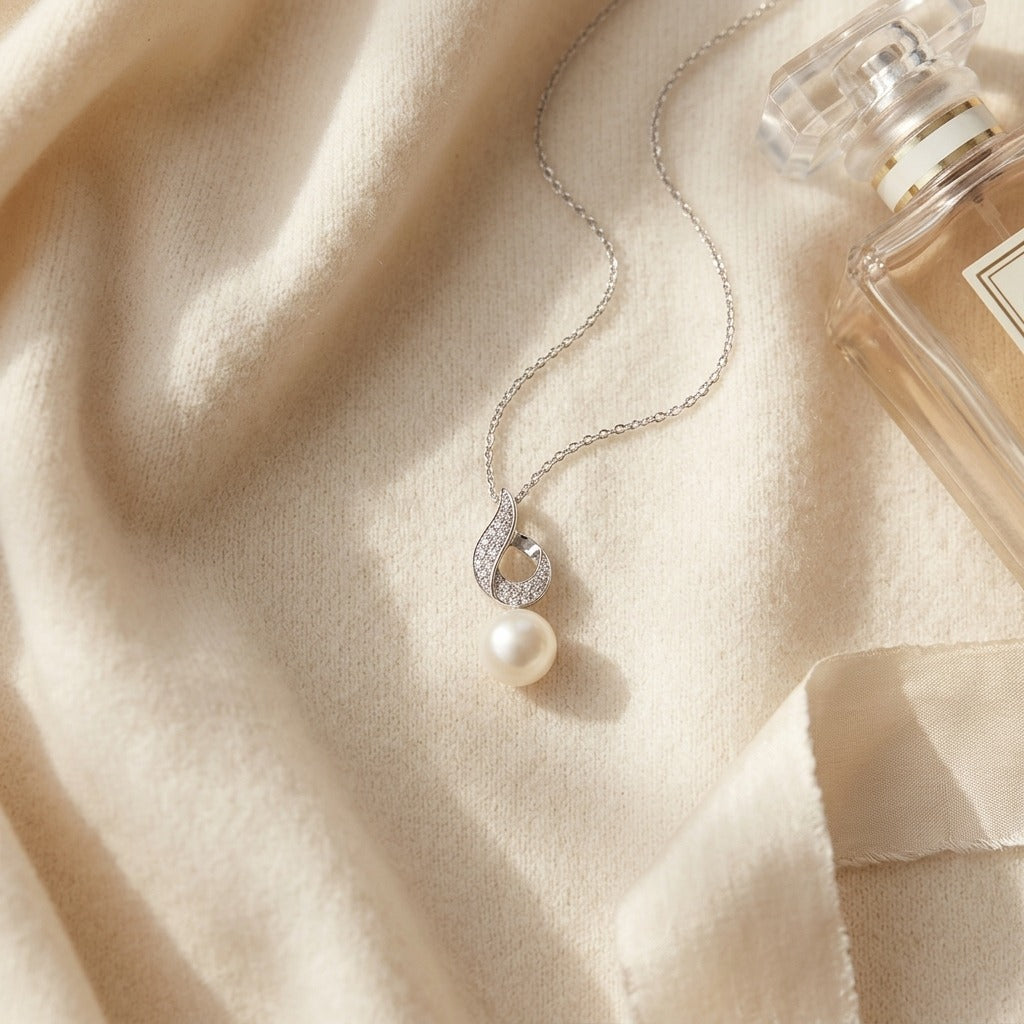 Freshwater Pearl and Diamond Pendant in 14k White Gold 0.07ctw — textile flat lay