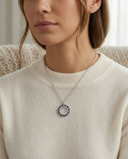 Sapphire and Diamond Circle Pendant in 14k White Gold 1/2ctw — editorial close-up