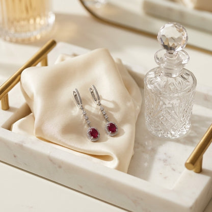 Ruby And Diamond Dangle Oval Halo Earrings In 14k White Gold (6x4mm) — marble silk