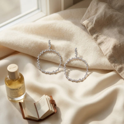 Scattered Diamonds Circle Earrings in 14k White Gold 3-3/8ctw — textile flat lay