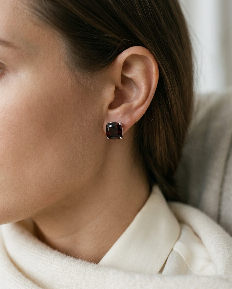 Garnet 8mm Cushion Stud Earrings In 14k White Gold — editorial close-up