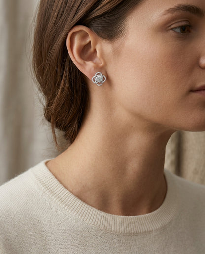 Diamond Crossed Knot Earrings In 14k White Gold — editorial close-up