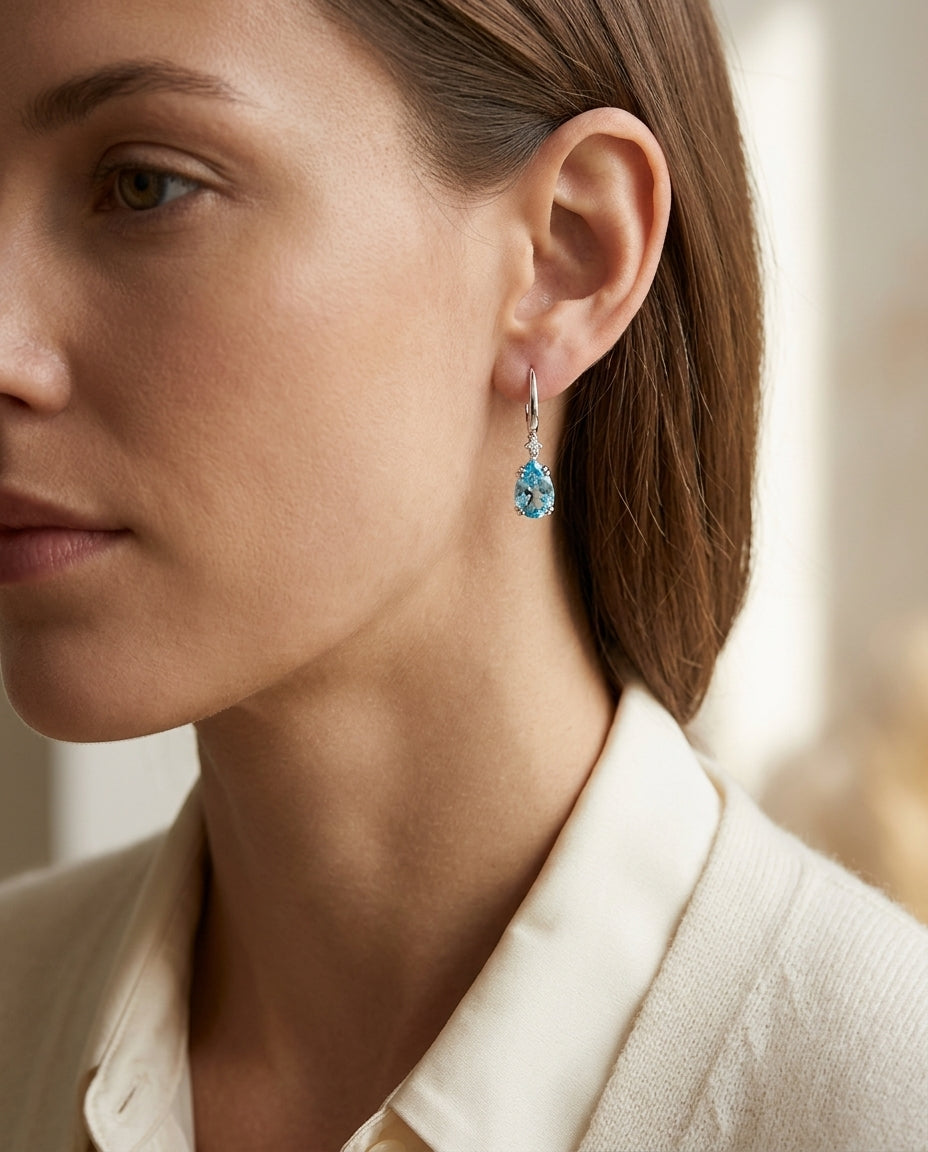 Blue Topaz And Diamond Teardrop Dangle Earrings In 14k White Gold (9x6mm) — editorial close-up