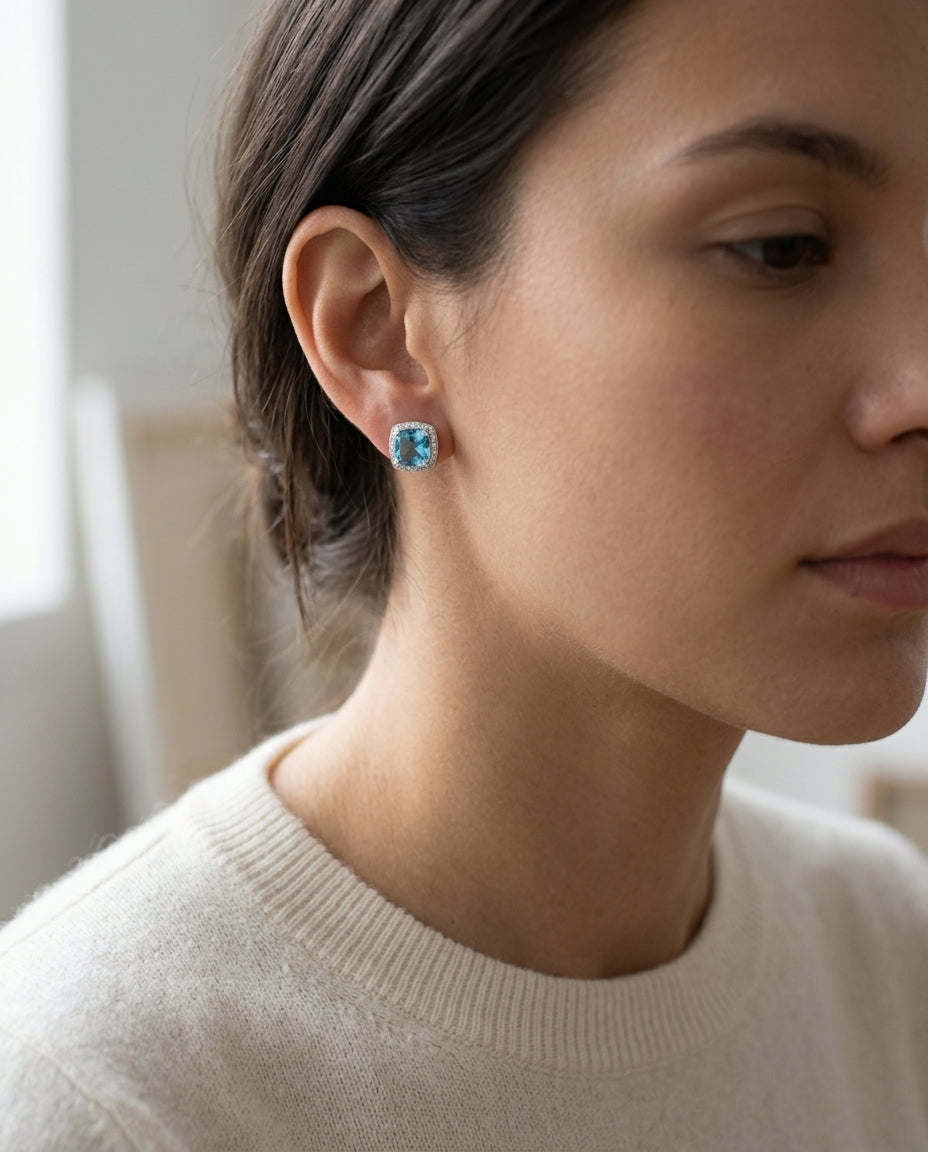 Swiss Blue Topaz Cushion Cut And Diamond Earrings In 14k White Gold — editorial close-up