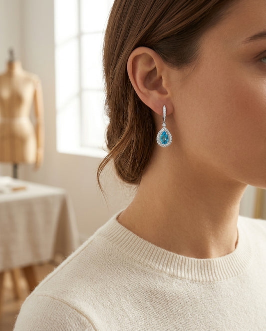 Swiss Blue Topaz And Diamond Earrings In 14k White Gold — editorial close-up