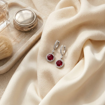 Ruby And Diamond Earrings In 14k White Gold (1/3 Ct. Tw.) — textile flat lay