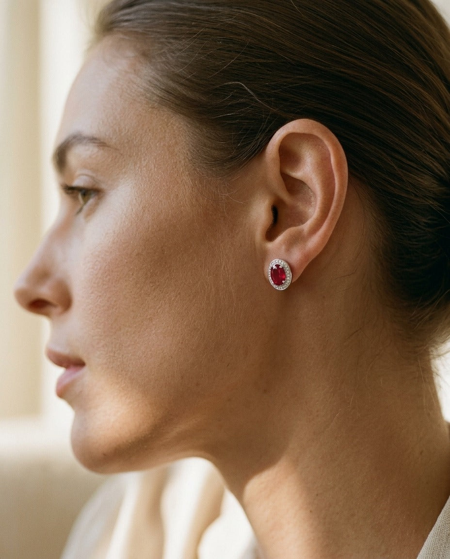 Ruby and Diamond Oval Halo Earrings in 14k White Gold — portrait close