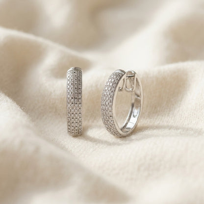 Diamond Princess Cut Huggie Earrings In 14k White Gold 1.0ctw — textile flat lay