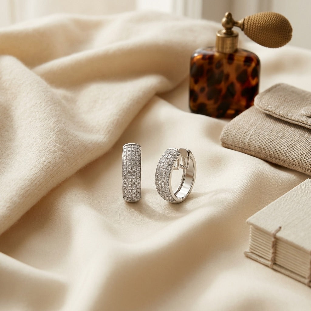 Diamond Princess Cut Huggie Earrings In 14k White Gold 1.50ctw — textile flat lay
