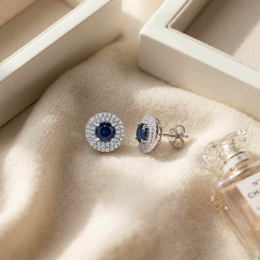 Sapphire and Diamond Double Halo Earrings in 14k White Gold (1/4 Ctw) — textile flat lay