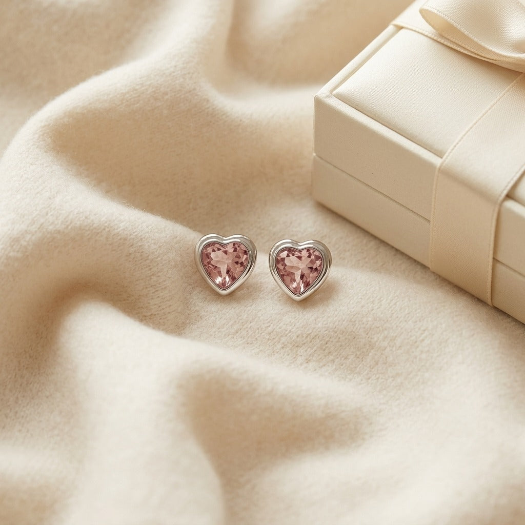 Heart Shaped Morganite & 14k White Gold Earring — textile flat lay