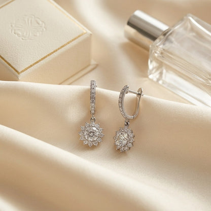 Diamond Sunburst Drop Earrings in 14k White Gold (Cz Centers) — textile flat lay