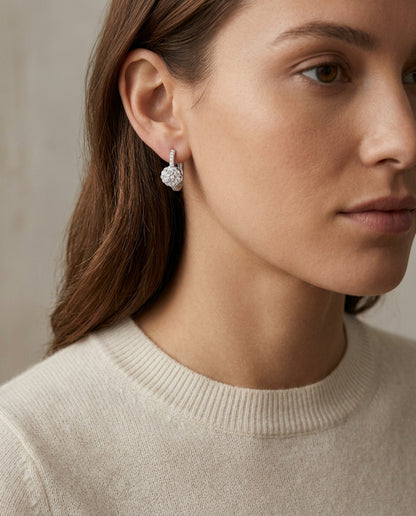 Diamond Cluster Huggie Earring In 14k White Gold — editorial close-up