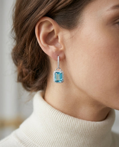 Swiss Blue Topaz And Diamond Earrings In 14k White Gold (1/3 Ct. Tw.) — editorial close-up