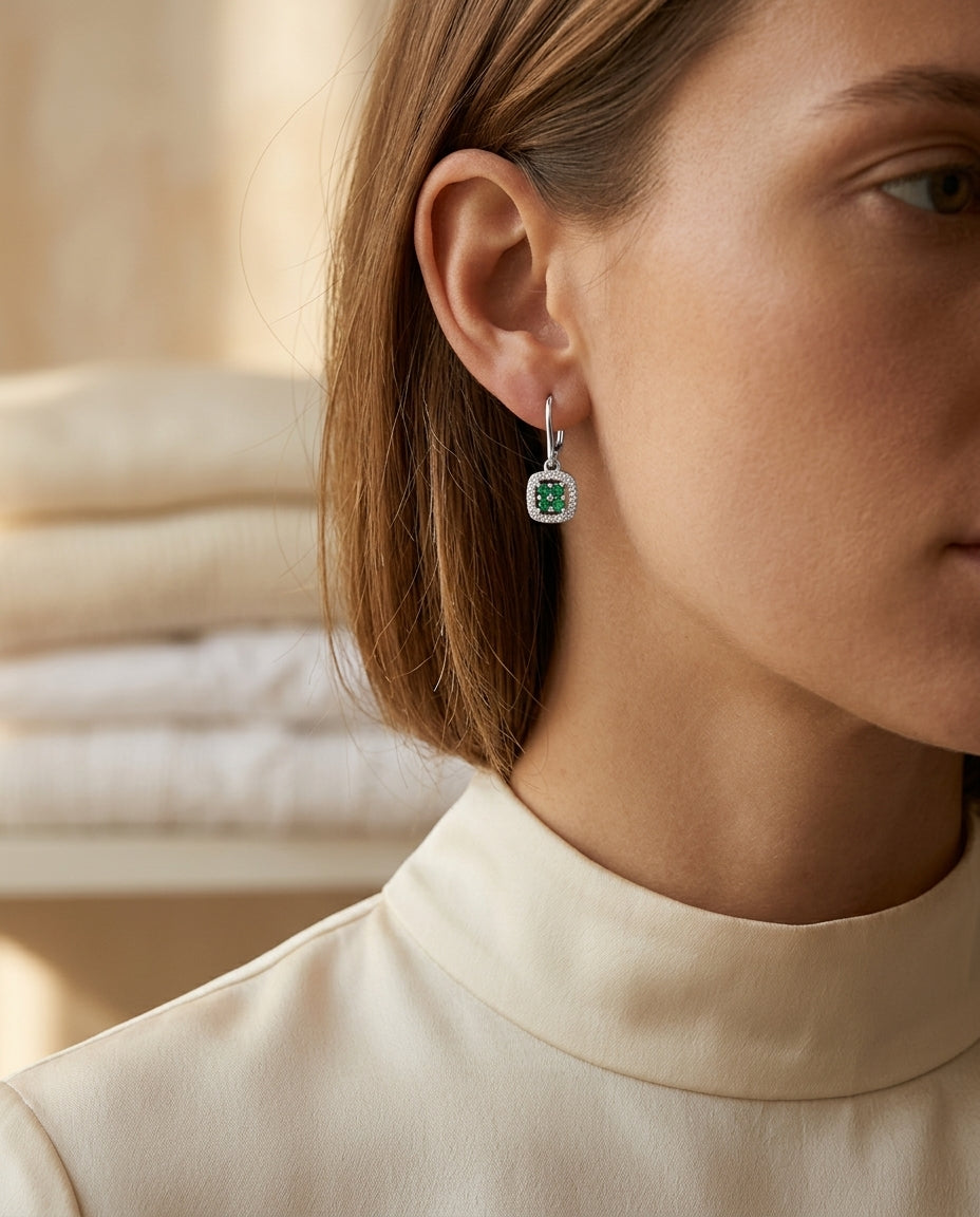 Created Emerald And Diamond Dangle Clover Leverback Earrings In 14k White Gold — editorial close-up