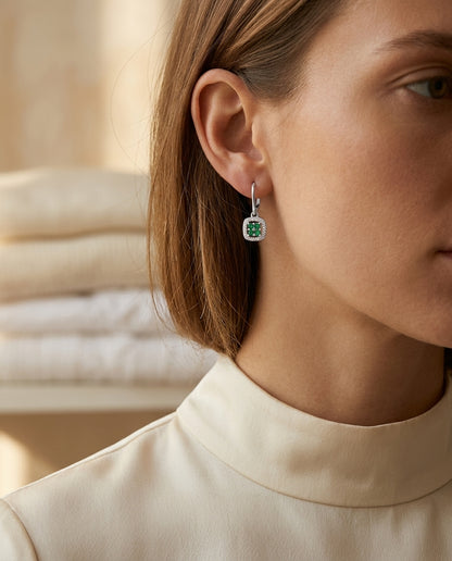 Created Emerald And Diamond Dangle Clover Leverback Earrings In 14k White Gold — editorial close-up