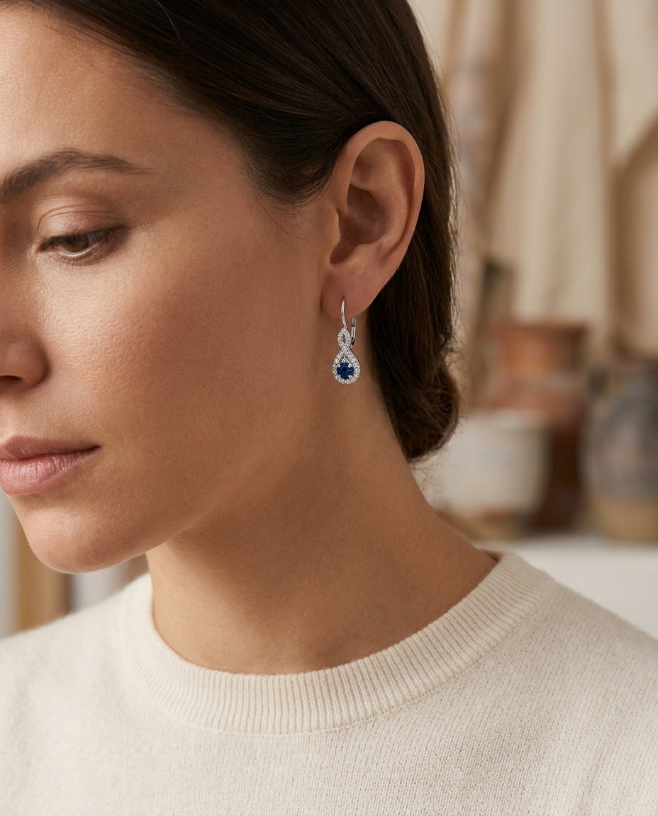 Sapphire And Diamond Earrings In 14k White Gold — editorial close-up