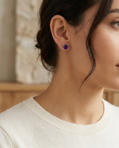 Amethyst Cushion 4 Prong Stud Earrings In 14 Karat White Gold — editorial close-up