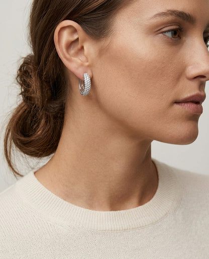 Diamond Pave Oval Huggie Earrings In 14k White Gold ( 0.62ctw) — editorial close-up