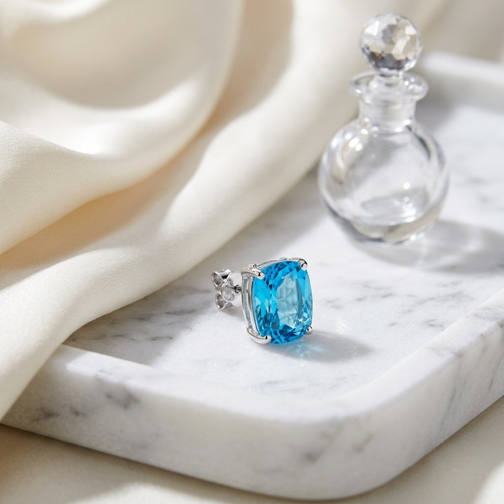 Blue Topaz Cushion 4 Prong Stud Earrings In 14k White Gold — atelier still life