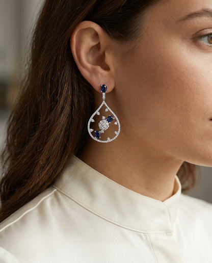 Sapphire And Diamond Cascade Tear Drop Dangling Earrings In 14k White Gold (si) — editorial close-up