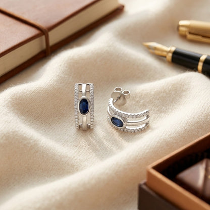 Sapphire And Diamond Open Work Earrings In 14k White Gold (1/4 Ct.tw.) — textile flat lay