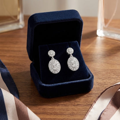 Diamond Oval Halo Dangle Earrings in 14k White Gold (3/8ctw) — velvet box
