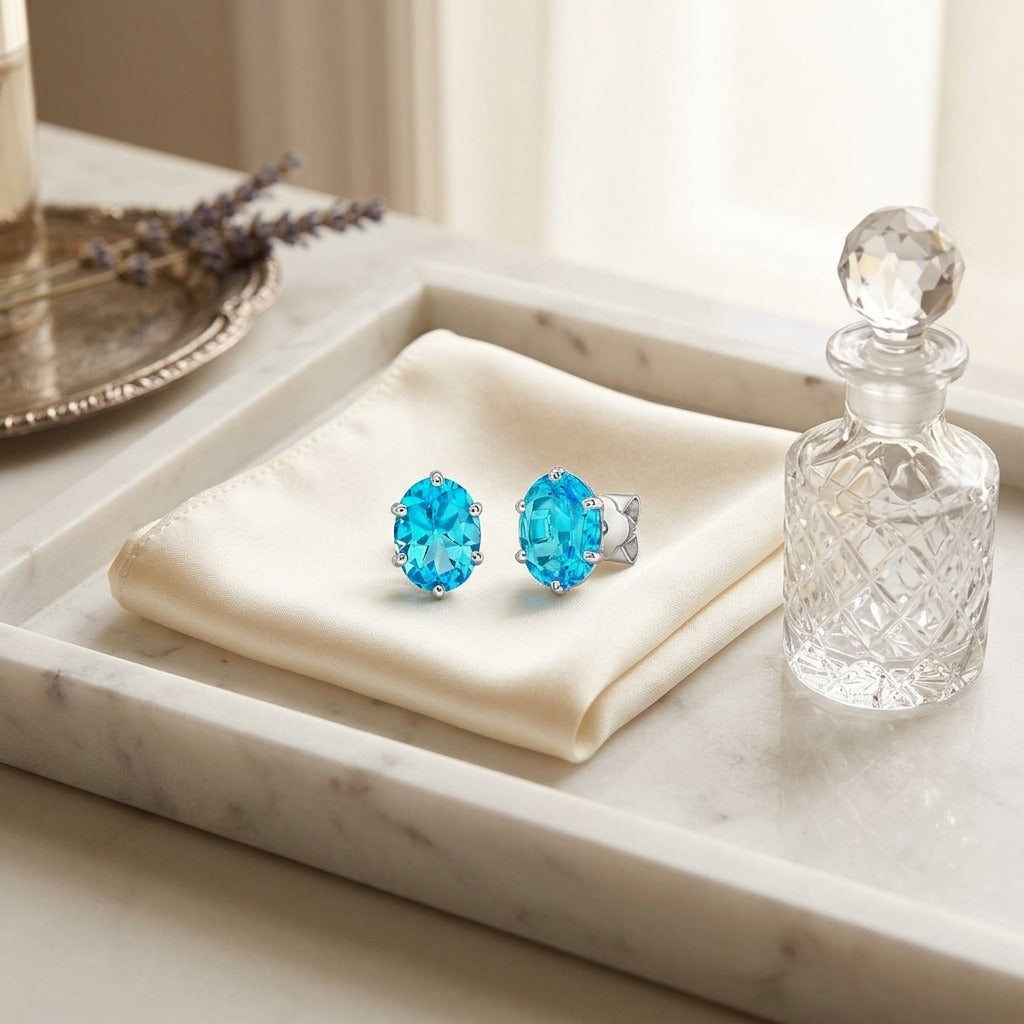 Blue Topaz Oval Stud Earrings in 14k White Gold (8x6mm) — marble silk