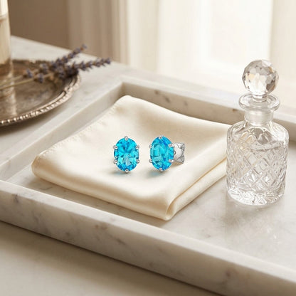 Blue Topaz Oval Stud Earrings in 14k White Gold (8x6mm) — marble silk