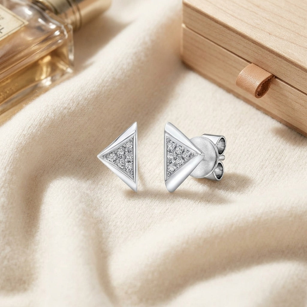Micro Pave Triangle Stud Earrings in 14k White Gold — textile flat lay