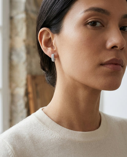 Diamond Hinged Back Huggie Hoop Earrings in 14k White Gold 3/8ctw — editorial close-up