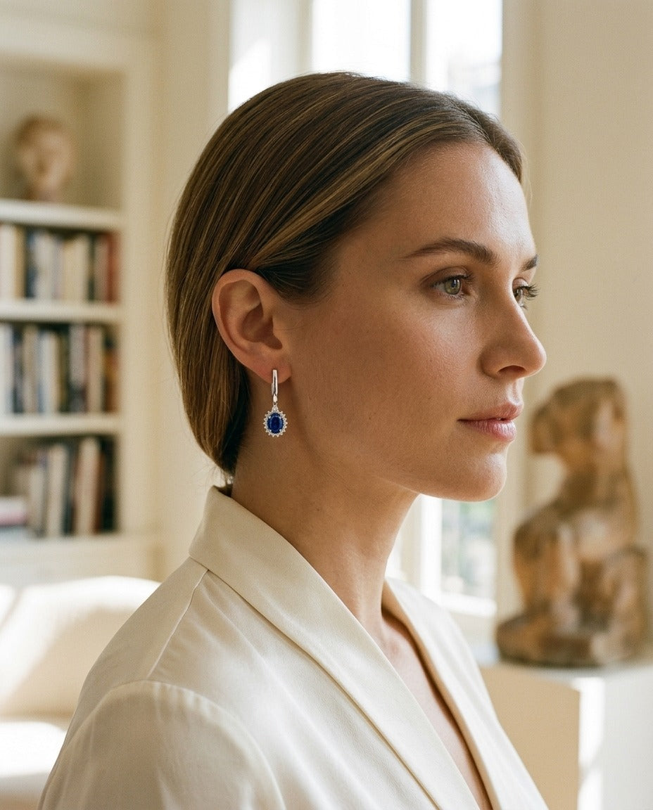 Sapphire Oval and Diamond Starburst Frame Earrings in 14k White Gold (7x5mm) — portrait close