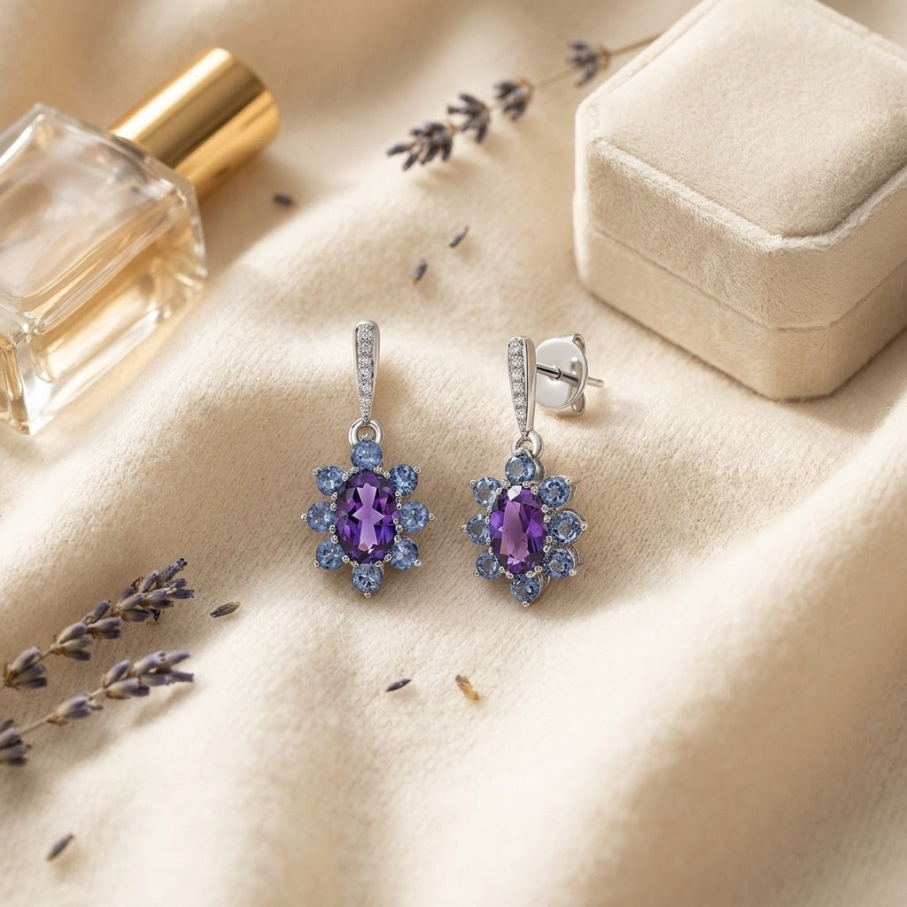 Amethyst, Iolite and Diamond Floral Drop Earrings in 14k White Gold — textile flat lay