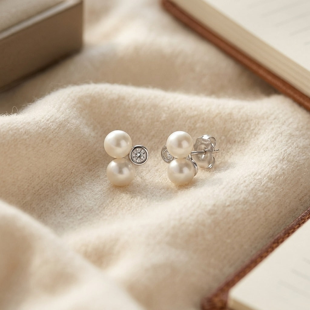 White Pearl and Diamond Bezel Duo Earring in 14k White Gold (4.0-5.5mm) — textile flat lay