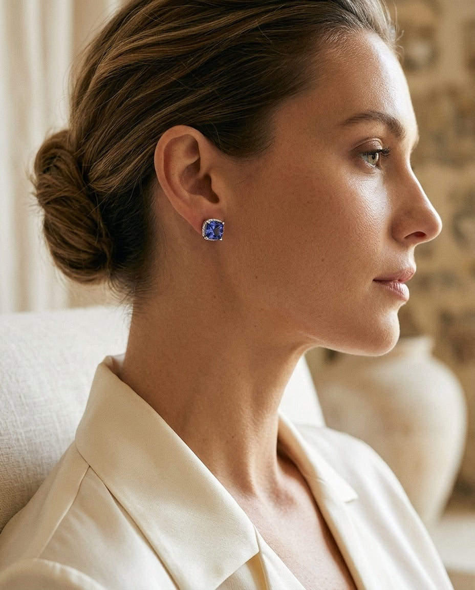 5 Millimeter Cushion Cut Tanzanite 4 Prong Studs in 14k White Gold — portrait close