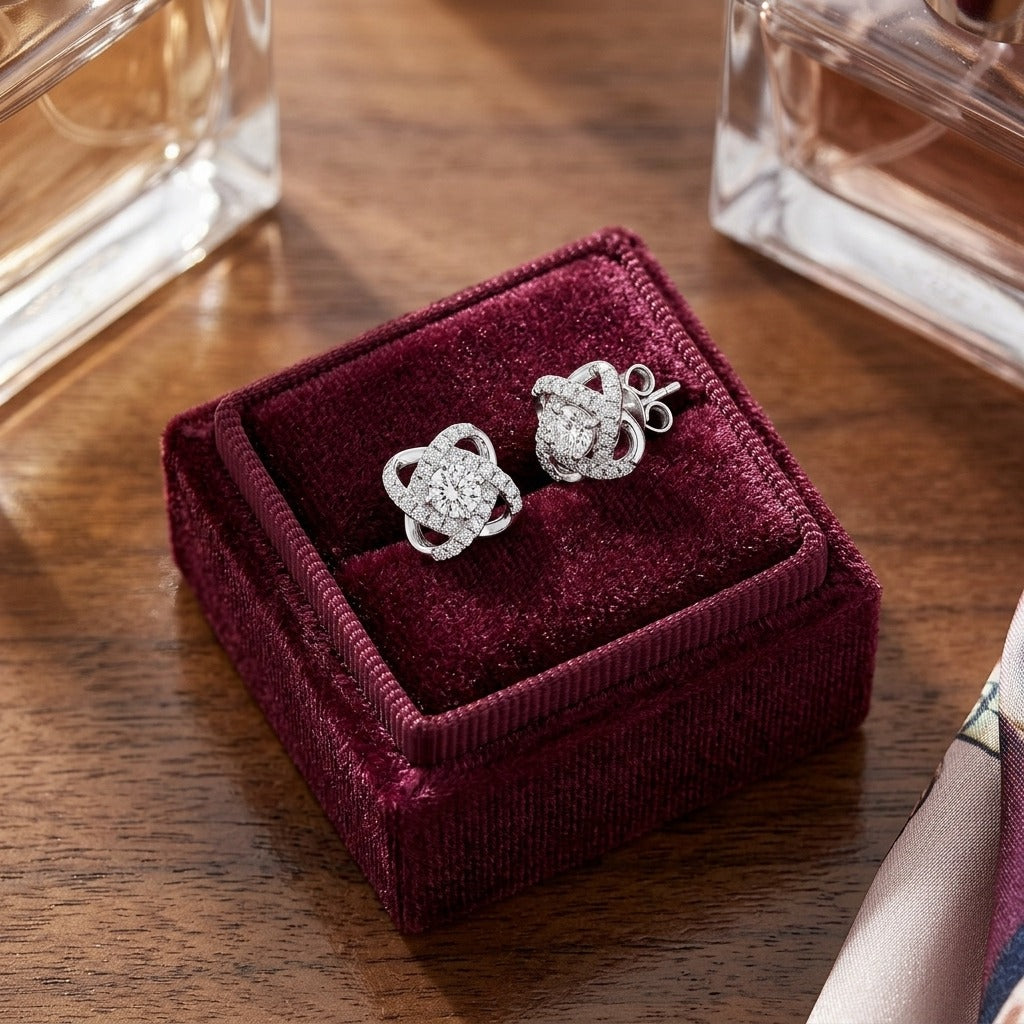 Diamond Pave Cross Knot Earrings with Round Centers in 14k White Gold — velvet box
