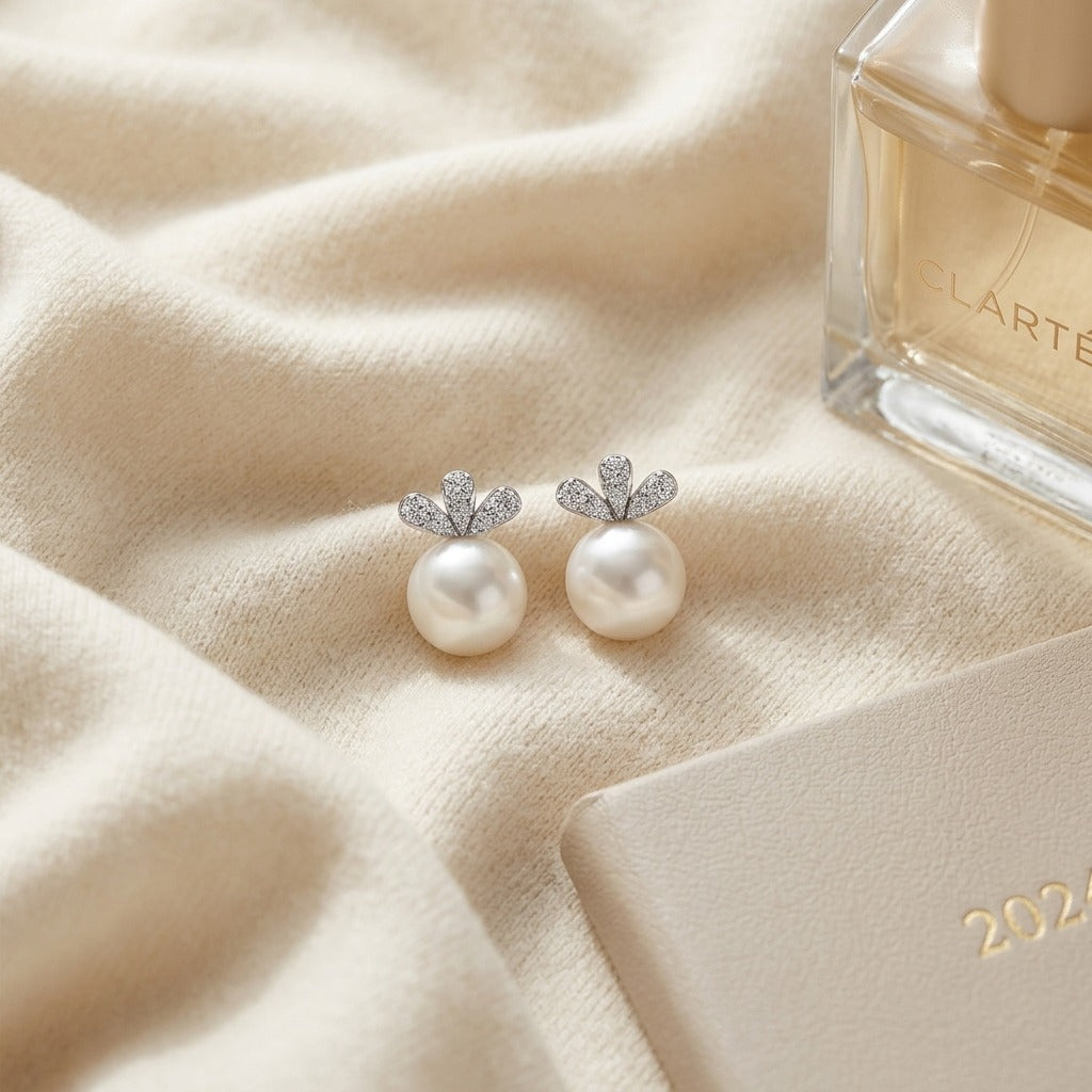 White Pearl and Diamond Earrings with Monarch Posts in 14k White Gold (9.0-9.5mm) (Si) — textile flat lay