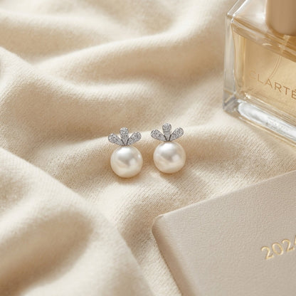 White Pearl and Diamond Earrings with Monarch Posts in 14k White Gold (9.0-9.5mm) (Si) — textile flat lay