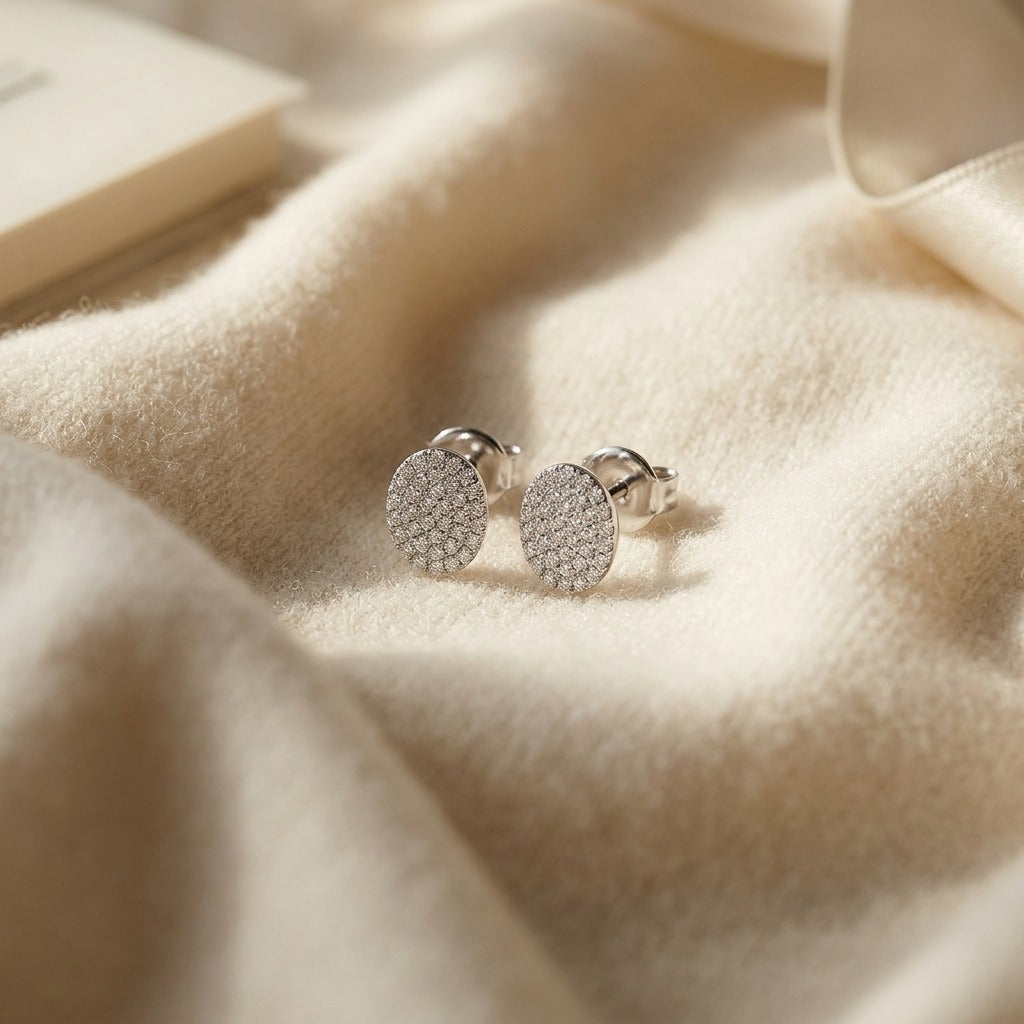 Diamond Pave Disk Stud Earrings in 14k White Gold — textile flat lay
