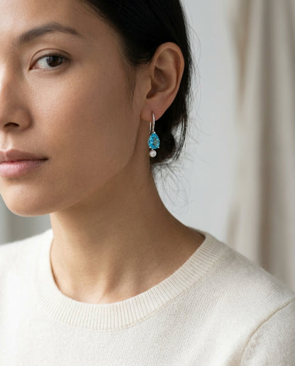 Pear Shaped Blue Topaz 7x5mm & Diamond 1/10ctw Leverback Drop Earrings Set in 14K White Gold - editorial hero