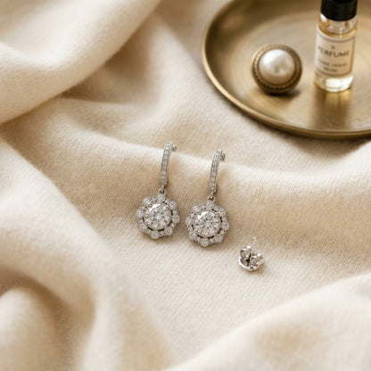 Diamond Dangle Halo Earrings in 14k White Gold 1-1/2ctw Round Brillliant Diamonds — textile flat lay
