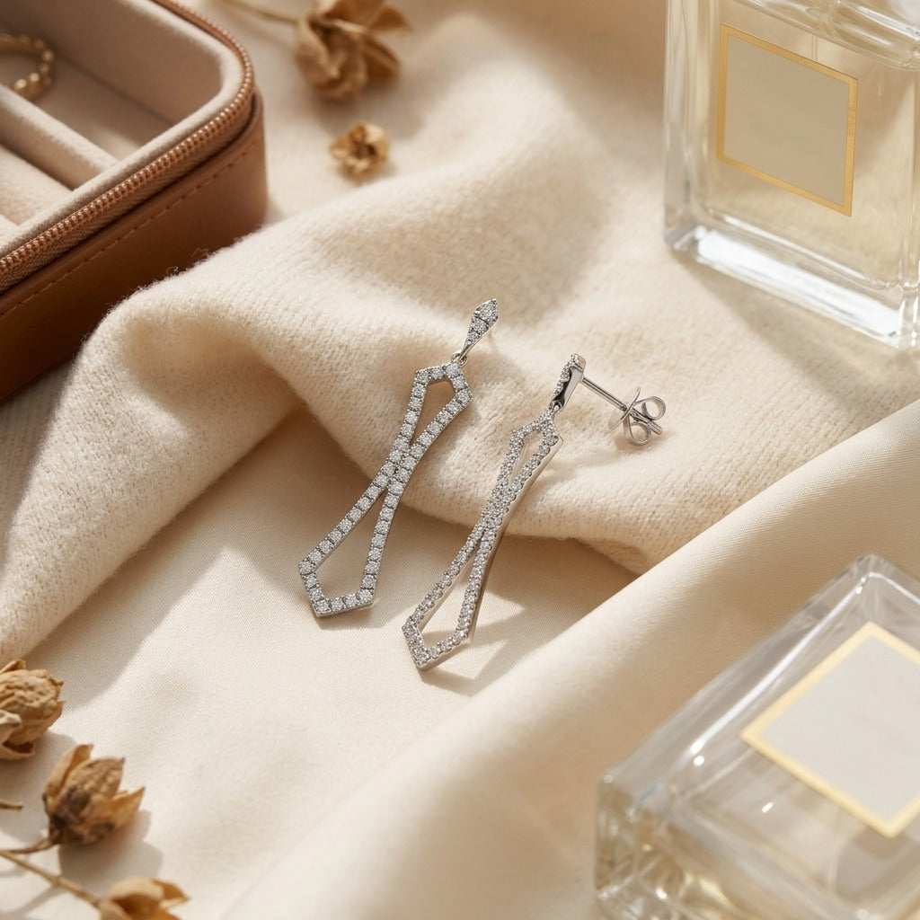 Diamond Dangle Motif Earrings in 14k White Gold 3/4ctw — textile flat lay