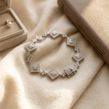 Diamond Geometric and Circle Bracelet in 14k White Gold — textile flat lay