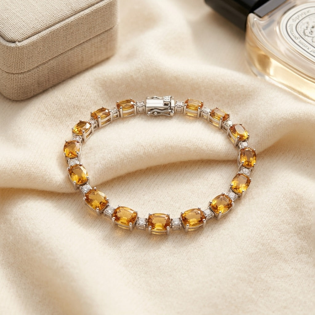 Citrine and Diamond Oval Bracelet with Round Prong Links in 14k White Gold (6x4mm) — textile flat lay