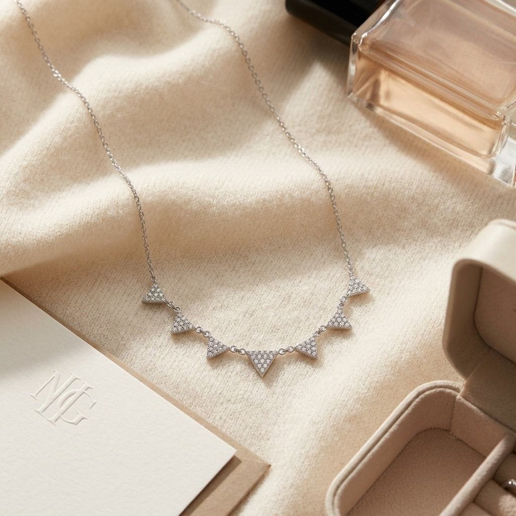 Diamond Pave 7-Triangle Necklace In 14k White Gold 16-18 Inch Adjustable Length — textile flat lay