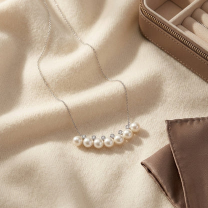 Freshwater Pearl Bar Necklace in 14k White Gold, 16-18 Inch Chain — textile flat lay