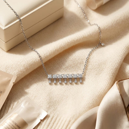 Diamond Princess Cut and Round Fringe Bar Necklace in 14k White Gold, 16-18 Inch Adj Chain — textile flat lay