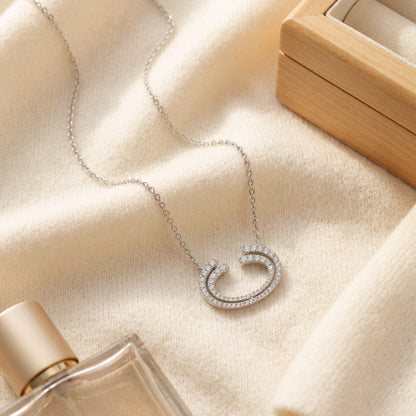 Diamond Crescent Necklace in 14k White Gold 1/4ctw Adjustable 16-17-18 Inch — textile flat lay