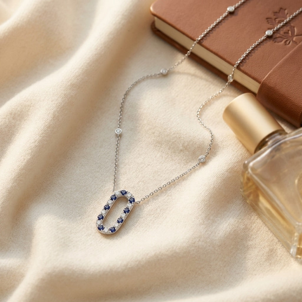 Sapphire and Diamond Alternating Paperclip Necklace in 14k White Gold 1/3ctw 16-18 Inch Adjustable Length — textile flat lay
